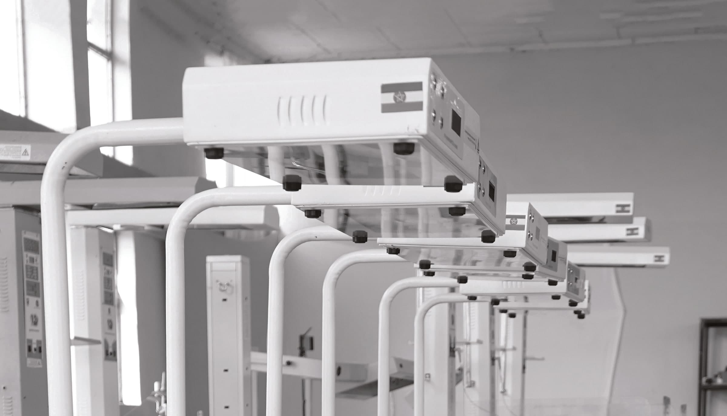 Row of LED phototherapy units on Simbona's production floor